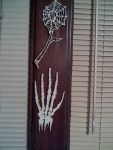 skeleton hand with skullwebrose