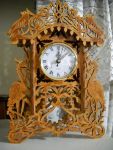 reloj calado con garzas