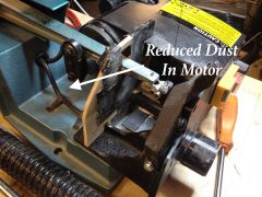 Dust Baffle Between Dust Port and Motor