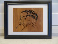 My grandson sleeping On My shoulder woodcut framed
