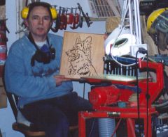 Me at one of my saws, just finished cutting a German Shepard Dog