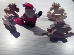 Father Christmas And Reindeer
