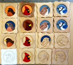 16 bird plaques In various stages Of completion