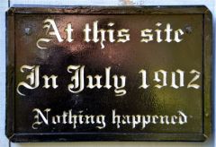 'At this Site' historic plaque  Framed And screwed into place outside  small