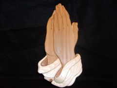 Preying hands