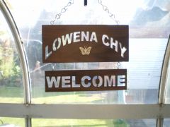 house sign in walnut