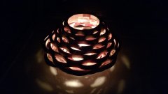 Wobble vase with candle in it