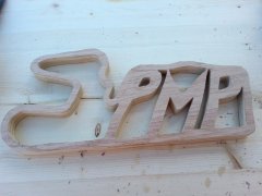 59788643a2fd1_PMPWoodtrackandlogo.jpg