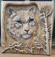 Snow Leopard carved in White Ash.jpg
